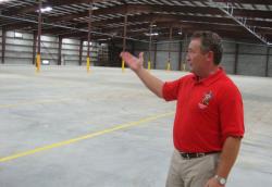 Diageo USVI Vice President Dan Kirby shows off one of the 100,000-square-foot warehouses completed Thursday. Diageo USVI Vice President Dan Kirby shows off one of the 100,000-square-foot warehouses completed Thursday.